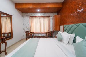 Postel nebo postele na pokoji v ubytování Hotel Bright Star