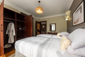 Postel nebo postele na pokoji v ubytování 1842 - 2br Serviced Apartment - Central