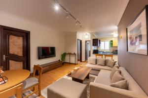 TV a/nebo společenská místnost v ubytování 1842 - 2br Serviced Apartment - Central