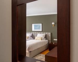 Postel nebo postele na pokoji v ubytování 1842 - 2br Serviced Apartment - Central