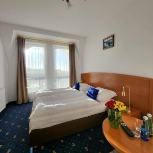 Postel nebo postele na pokoji v ubytování Uśmiech Morza