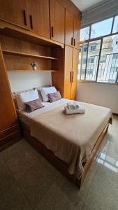 Postel nebo postele na pokoji v ubytování Copacabana Beach Studio