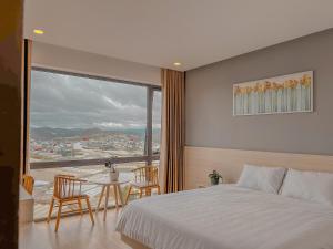 Krevet ili kreveti u jedinici u okviru objekta Lux Nest hotel