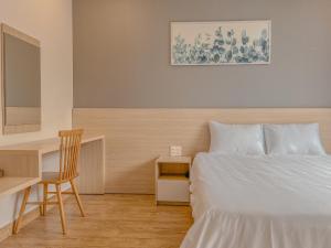 Krevet ili kreveti u jedinici u okviru objekta Lux Nest hotel