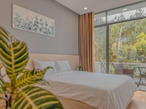 Krevet ili kreveti u jedinici u okviru objekta Lux Nest hotel
