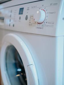 a close up of a washing machine at The Majestic Place - Sheffield City Centre in Sheffield +10 photos