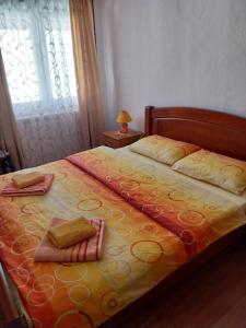Postel nebo postele na pokoji v ubytování Rent a rooms - "Laki"