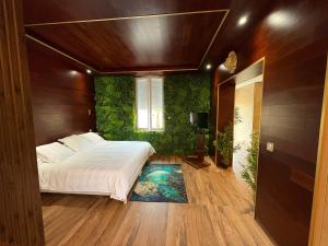 Giường trong phòng chung tại BALIROOM Prestige