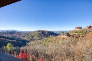 a view of the mountains from the porch of a house at Million Dollar Views with Hot Tub and Pool Near Dollywood in Sevierville