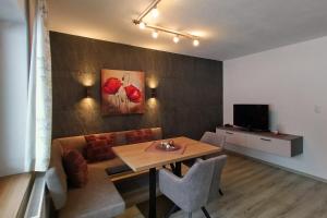 A television and/or entertainment centre at Haus Enzian