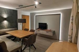 A television and/or entertainment centre at Haus Enzian