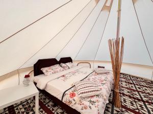 Voodi või voodid majutusasutuse Starlight privet camp toas