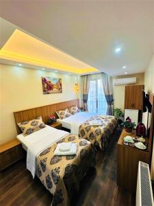 Postel nebo postele na pokoji v ubytování Hotel By Historia
