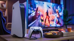 a video game controller sitting on a table in front of a tv at Liberty Dream - 20 min to NYC in Jersey City