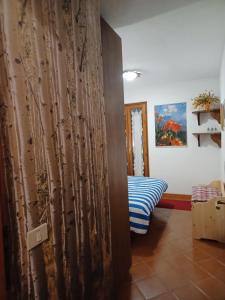 Postel nebo postele na pokoji v ubytování casa Margherita