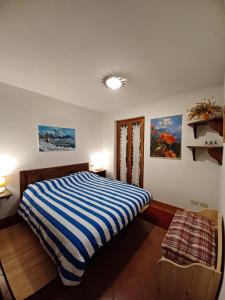 Postel nebo postele na pokoji v ubytování casa Margherita