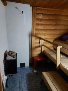 Postel nebo postele na pokoji v ubytování Sallan Lomaväinö 15