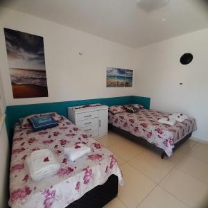 En eller flere senge i et værelse på Doce Villa + 10 billeder