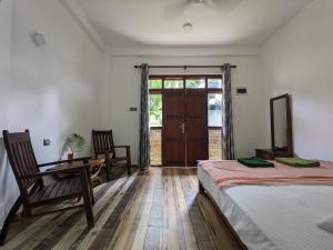Letto o letti in una camera di Caspian Mirissa