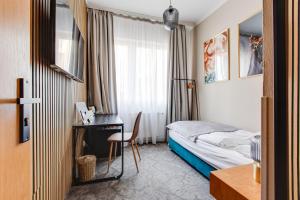 Postel nebo postele na pokoji v ubytování Hotel Andante