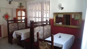 A bed or beds in a room at Micófogadó