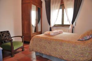 Postel nebo postele na pokoji v ubytování Casa Rural La Cuadraá