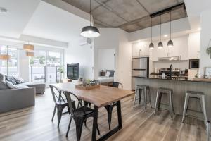 Kuchyň nebo kuchyňský kout v ubytování Le Panorama - Parking gratuit - Toit terrasse