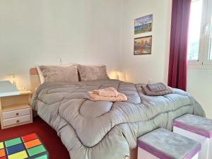 Posteľ alebo postele v izbe v ubytovaní Allas, Guest Art