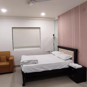 Ένα ή περισσότερα κρεβάτια σε δωμάτιο στο BS Homes - Serviced Apartments