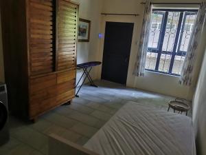 Ένα ή περισσότερα κρεβάτια σε δωμάτιο στο Residential house guests