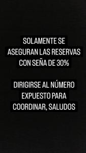 a sign with the names of a number on a black background at CABAÑA PRIVADA NALÚ in Villa Ciudad Parque