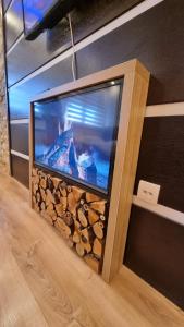 TV a/nebo společenská místnost v ubytování Lux Apartman Kop Zoned