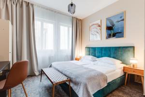 Postel nebo postele na pokoji v ubytování Hotel Andante
