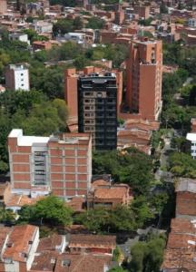 a view of a city with tall buildings at Hotel Living 35 Suites Piso 8 Vip in Medellín