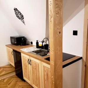 Η κουζίνα ή μικρή κουζίνα στο Apartamenty HAWOK +12 φωτογραφίες