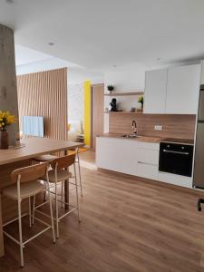 Kuchyň nebo kuchyňský kout v ubytování Apartamento Mimosa Diseño Exclusivo