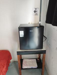 Φωτογραφία από το άλμπουμ του Suite com estacionamento privativo próximo a praia σε Πράια Γκράντε