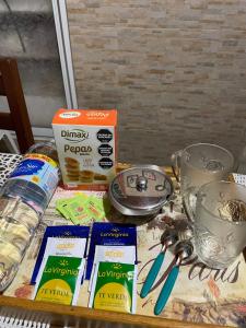 a table with some food on a table at APART LyM 1 in Clorinda +3 photos