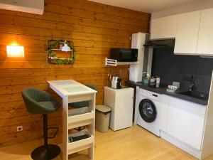 Kuchyň nebo kuchyňský kout v ubytování Studio cosy Jons