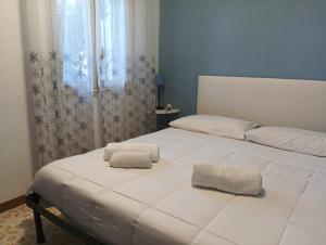Postel nebo postele na pokoji v ubytování Casa Fronte Mare