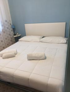 Postel nebo postele na pokoji v ubytování Casa Fronte Mare
