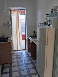 Kuchyň nebo kuchyňský kout v ubytování Casa Fronte Mare