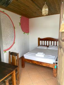 Postel nebo postele na pokoji v ubytování Guava Hostel Serra Grande