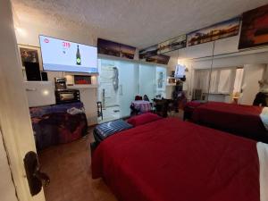 Una televisión o centro de entretenimiento en Villa Tarsia