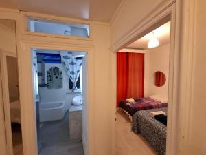 Una cama o camas en una habitación de Villa Tarsia