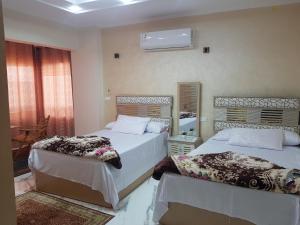 Tempat tidur dalam kamar di Sphinx square, Mohandessin