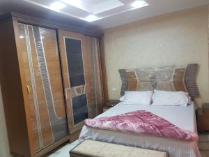 Tempat tidur dalam kamar di Sphinx square, Mohandessin