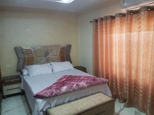 Tempat tidur dalam kamar di Sphinx square, Mohandessin
