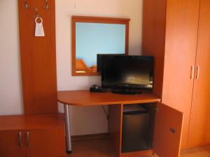TV a/nebo společenská místnost v ubytování Villa Rosa