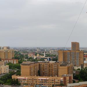 Cảnh Astana hoặc tầm nhìn thành phố từ căn hộ +7 ảnh